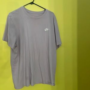 purple nike shirt